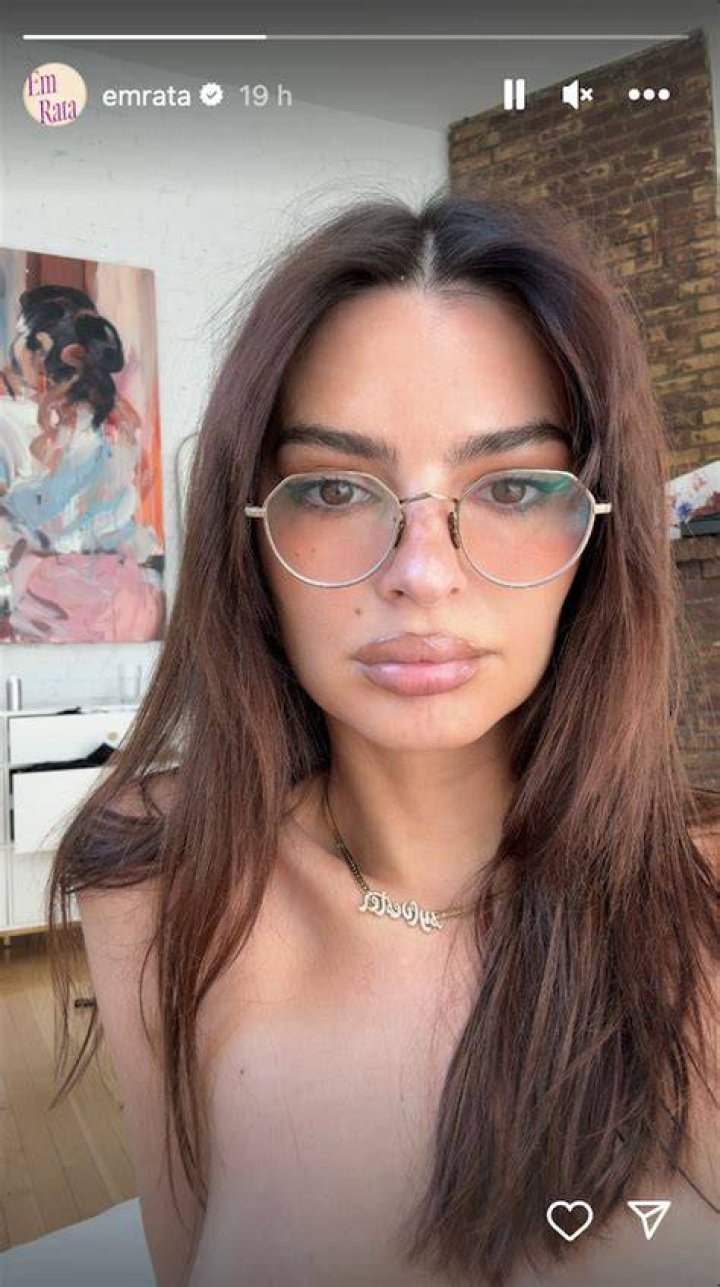 Selfie time: EmRata's first Instagram story post was taken in a hallway where she was showing off her white mini-dress with a selfie